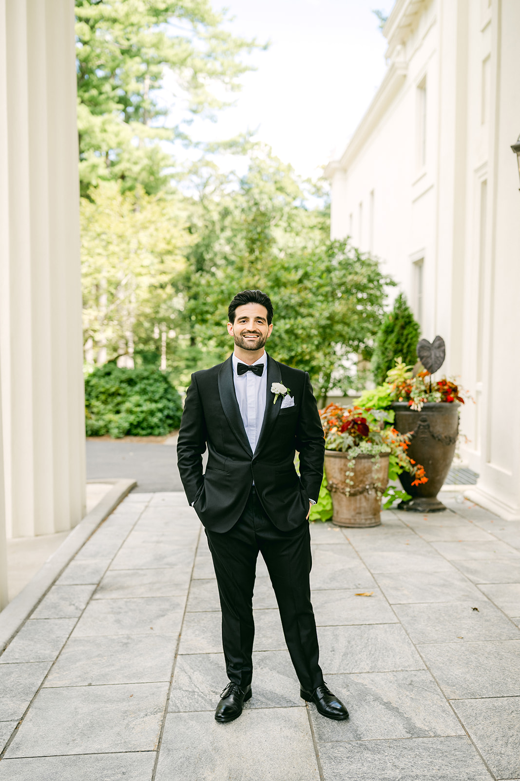 Groom wearing a classic black tuxedo