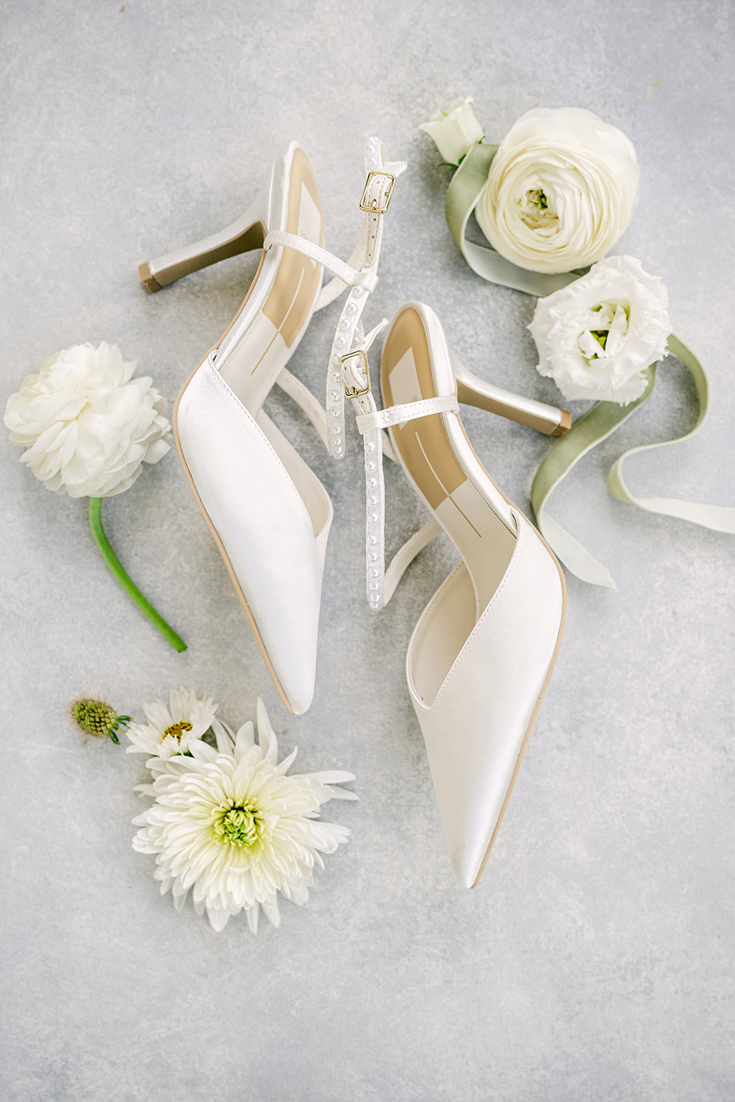 Pointed bridal heels with pearl details for elegant wedding shoes