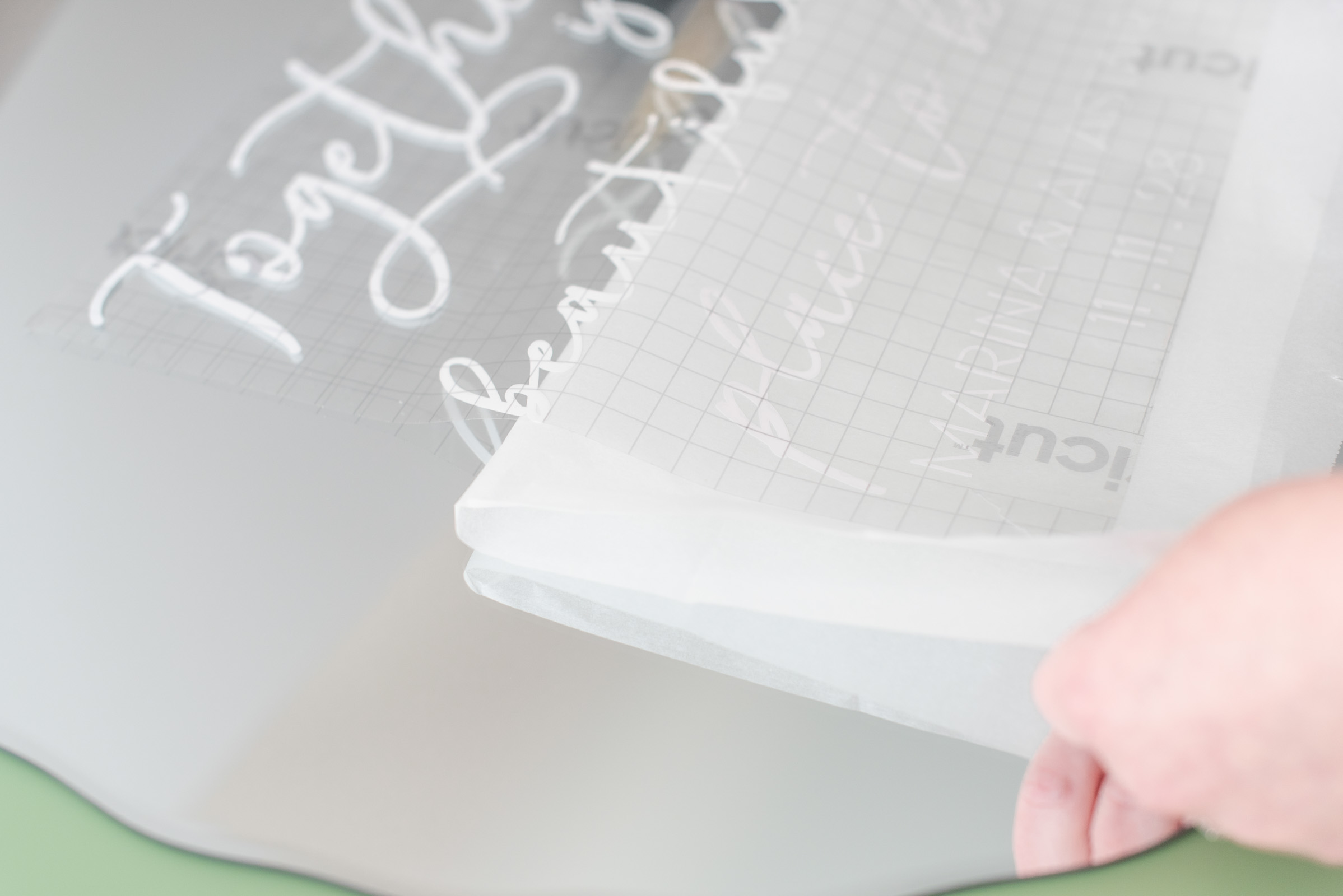 Step by step tutorial on how to transform a mirror into a wedding welcome sign with a Cricut machine