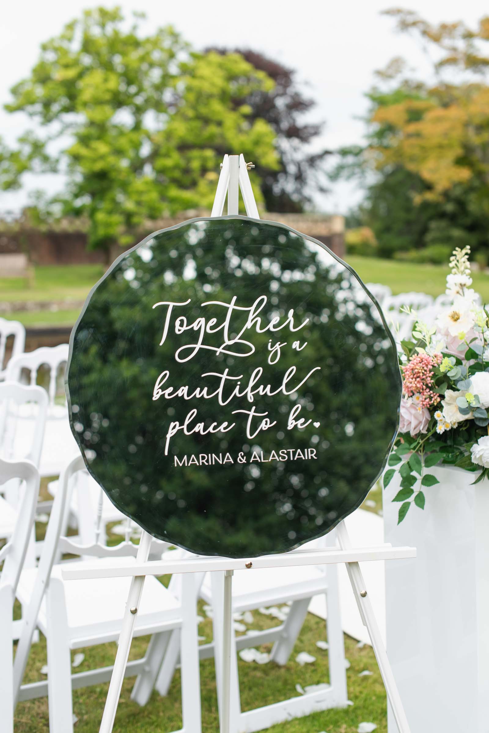 DIY wedding welcome mirror sign made with a Cricut from the Cricut Weddings book by Chelsea Barton
