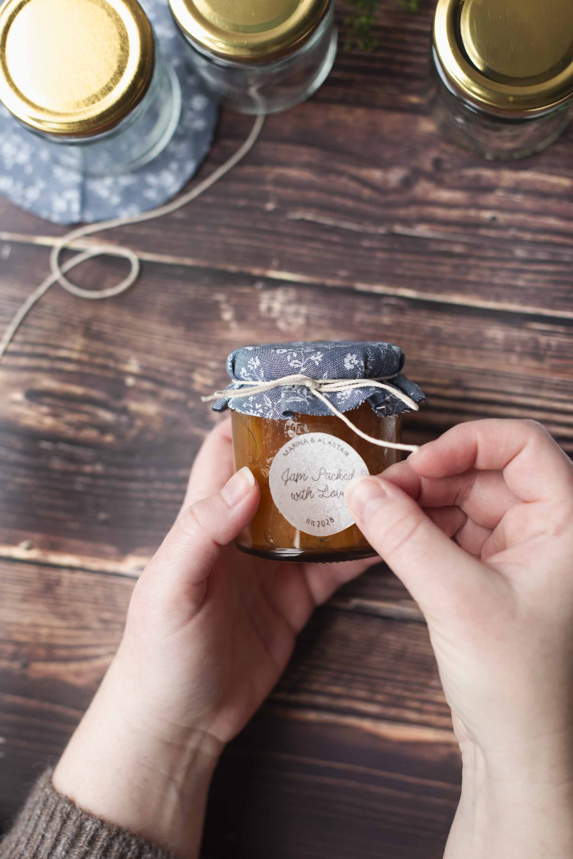 Sustainable wedding favor idea with jam jars and dissolvable label paper stickers