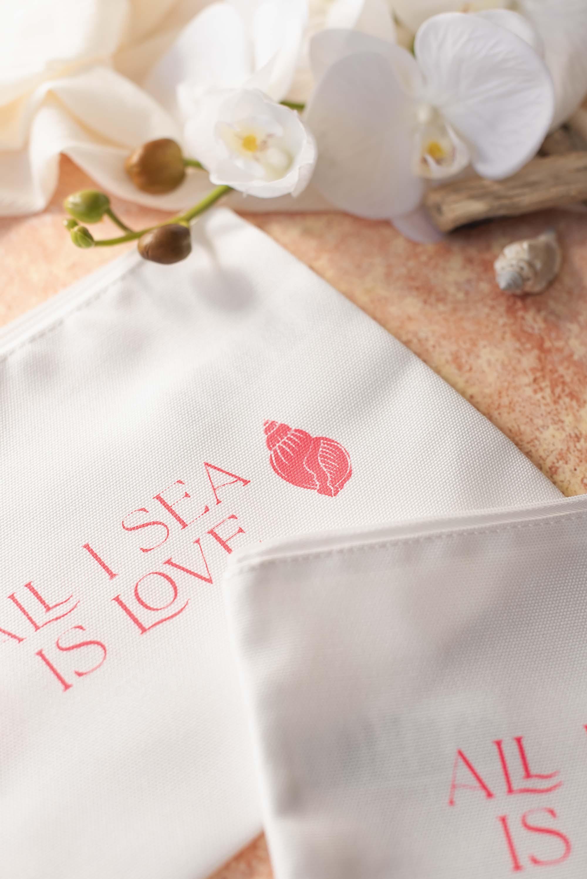 Pink coastal themed bachelorette party zip travel bags