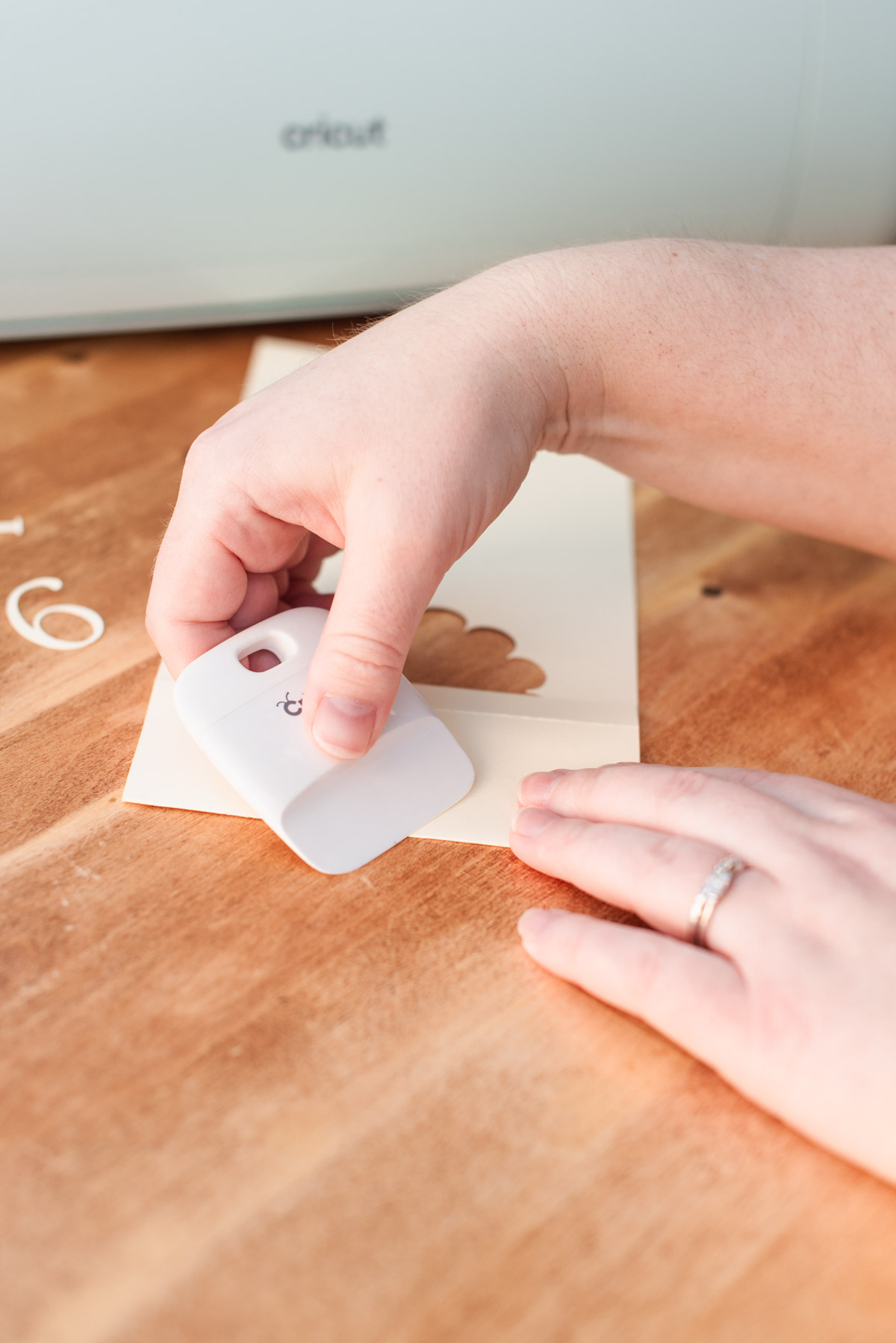 Easy Cricut wedding table number luminaries made with paper cardstock and vellum