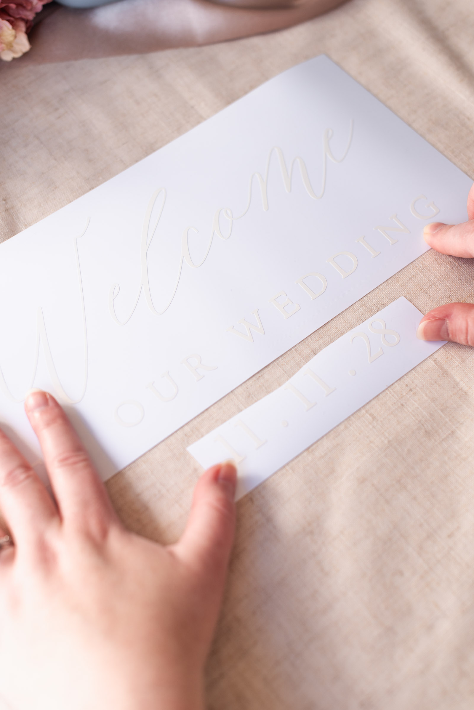 How to personalize a wedding welcome sign with a flower box and Cricut vinyl