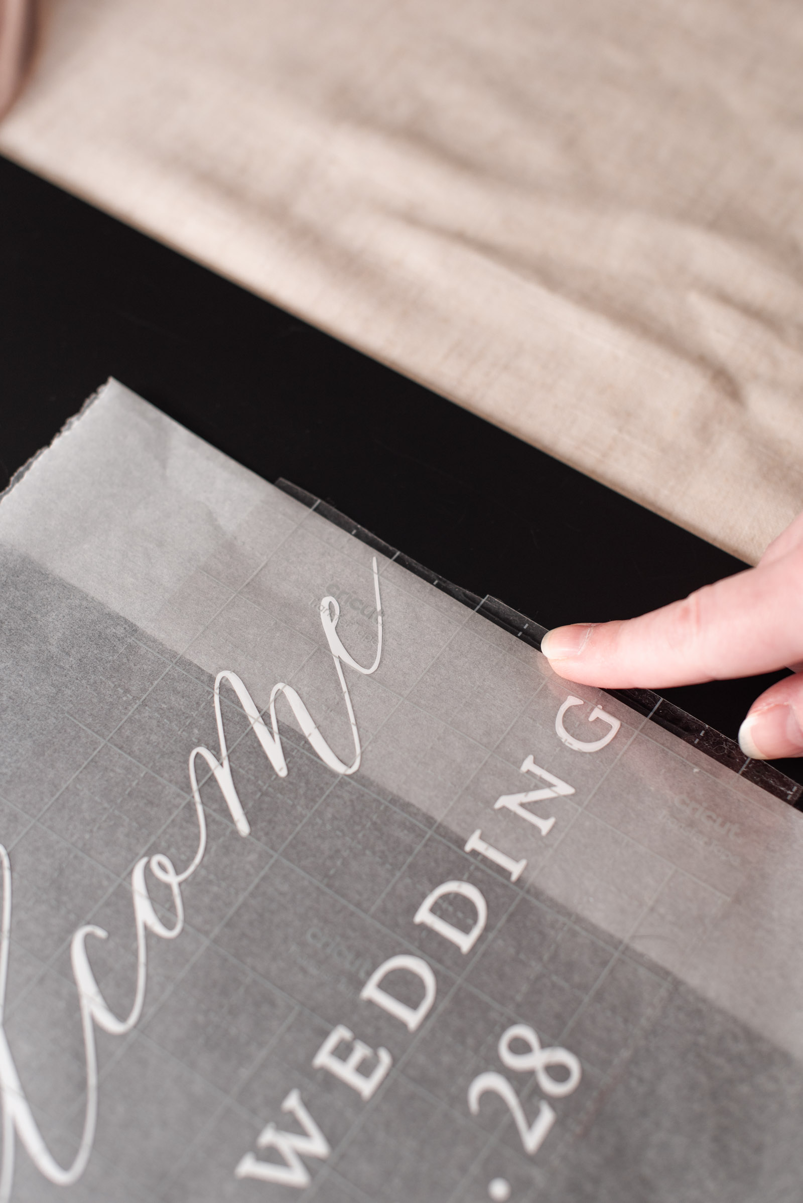 Best hacks for transferring vinyl onto wedding signs