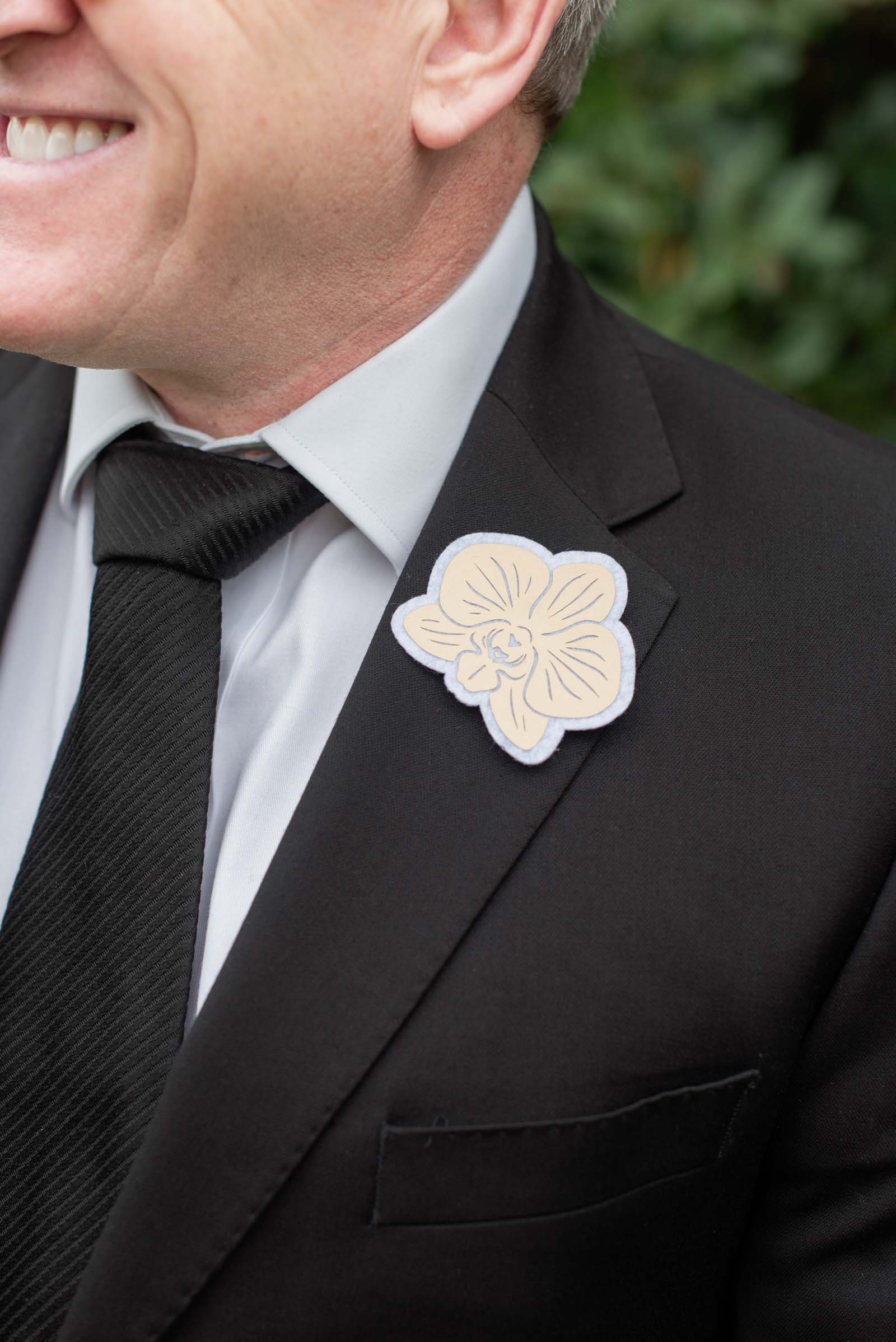 Felt and heat transfer vinyl used to make an orchid boutonniere