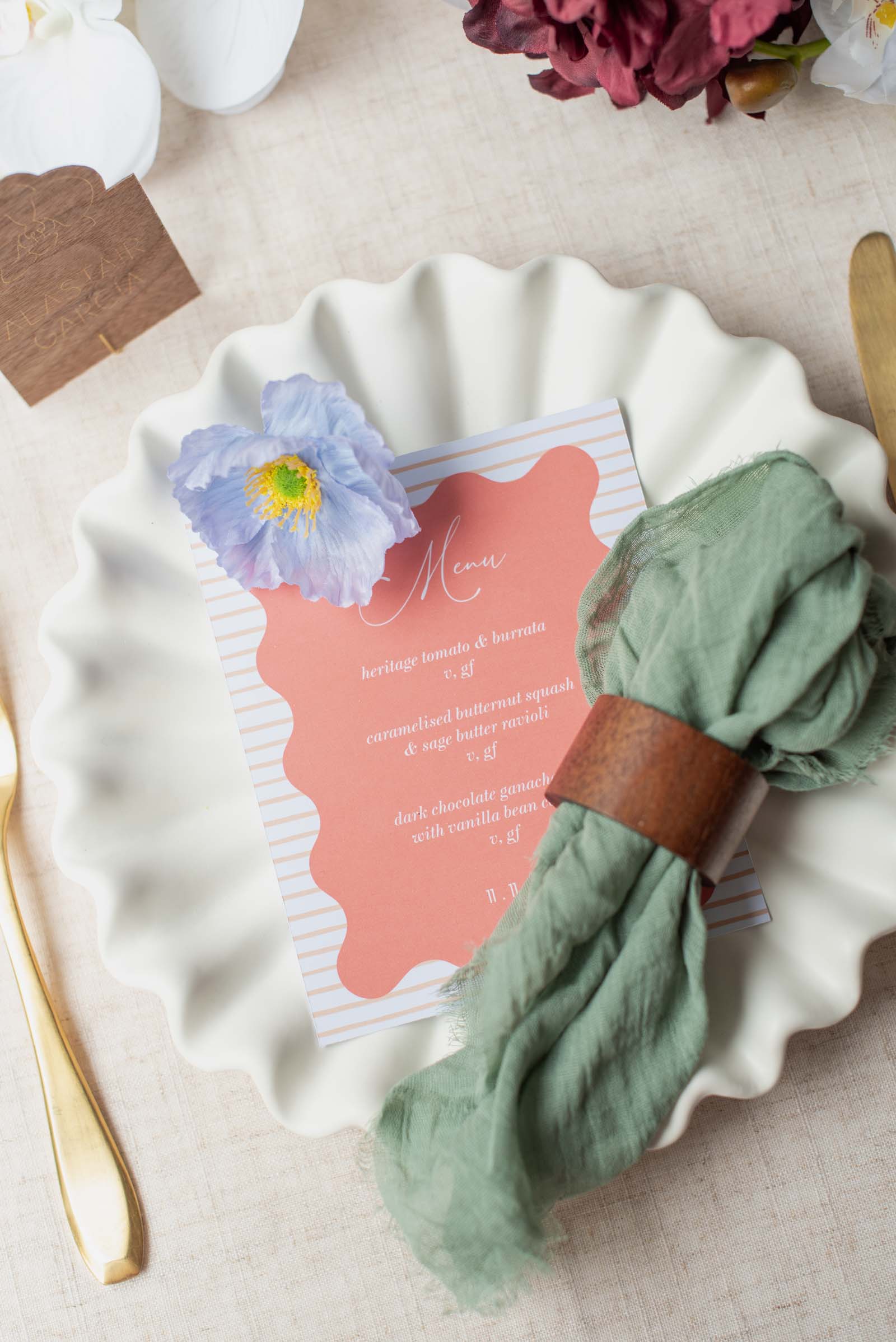 Trendy wavy shape coral orange printed wedding menu cards