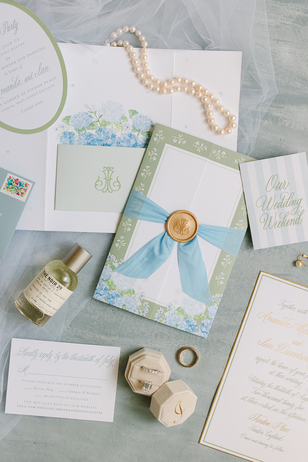 Green and blue wedding stationery with blue hydrangea flower illustrations