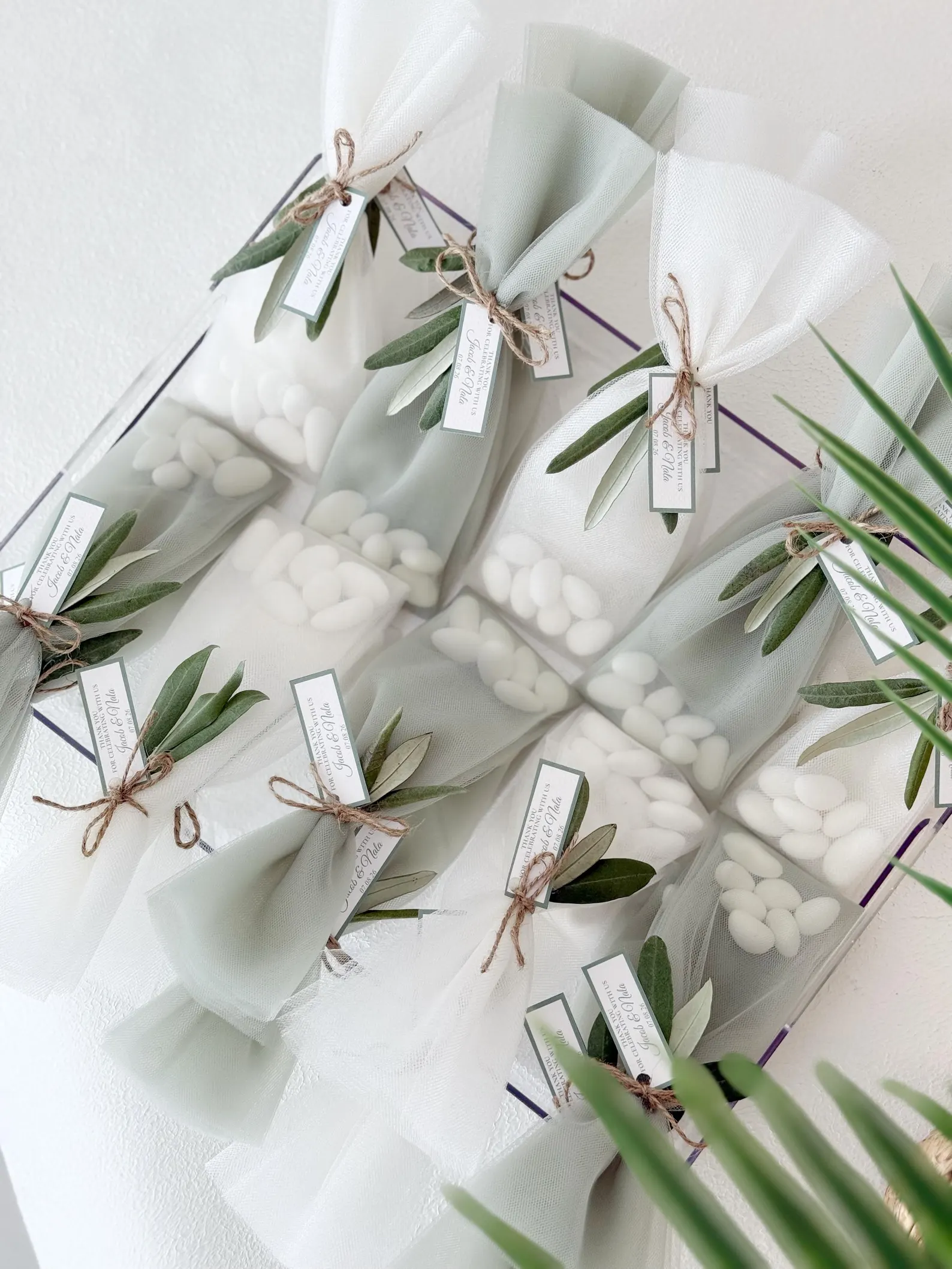 Tulle wedding favors with sugared jordan almonds
