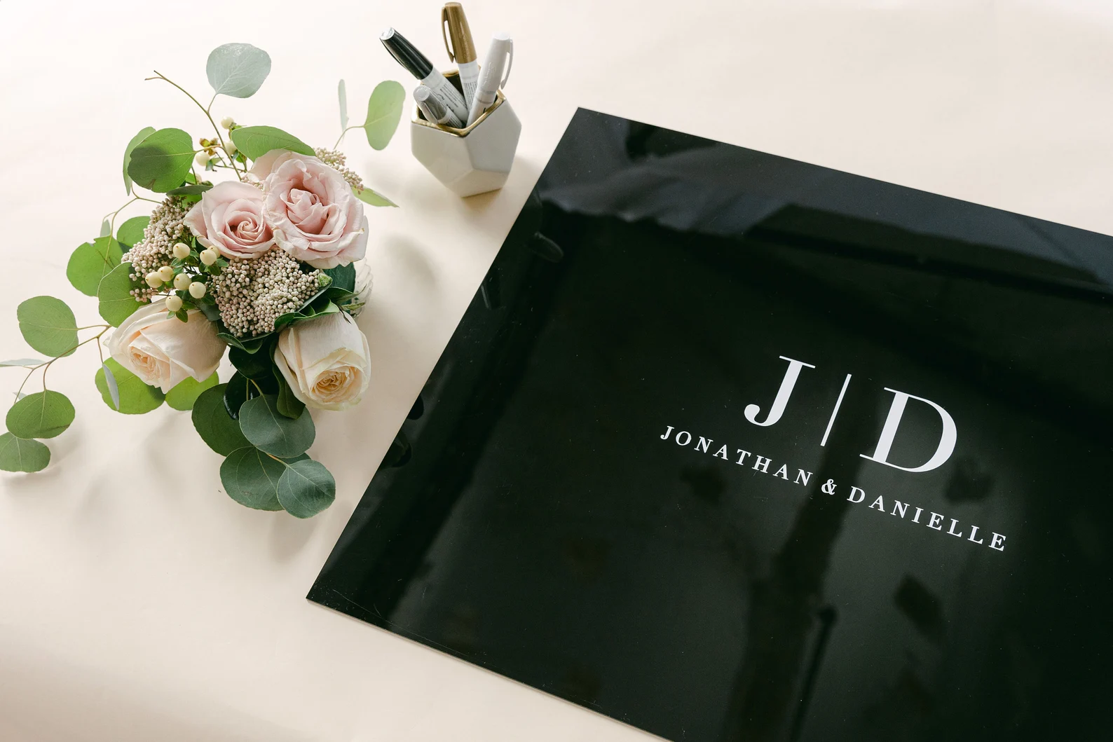 Modern acrylic wedding guest book for guests to sign with white permanent marker