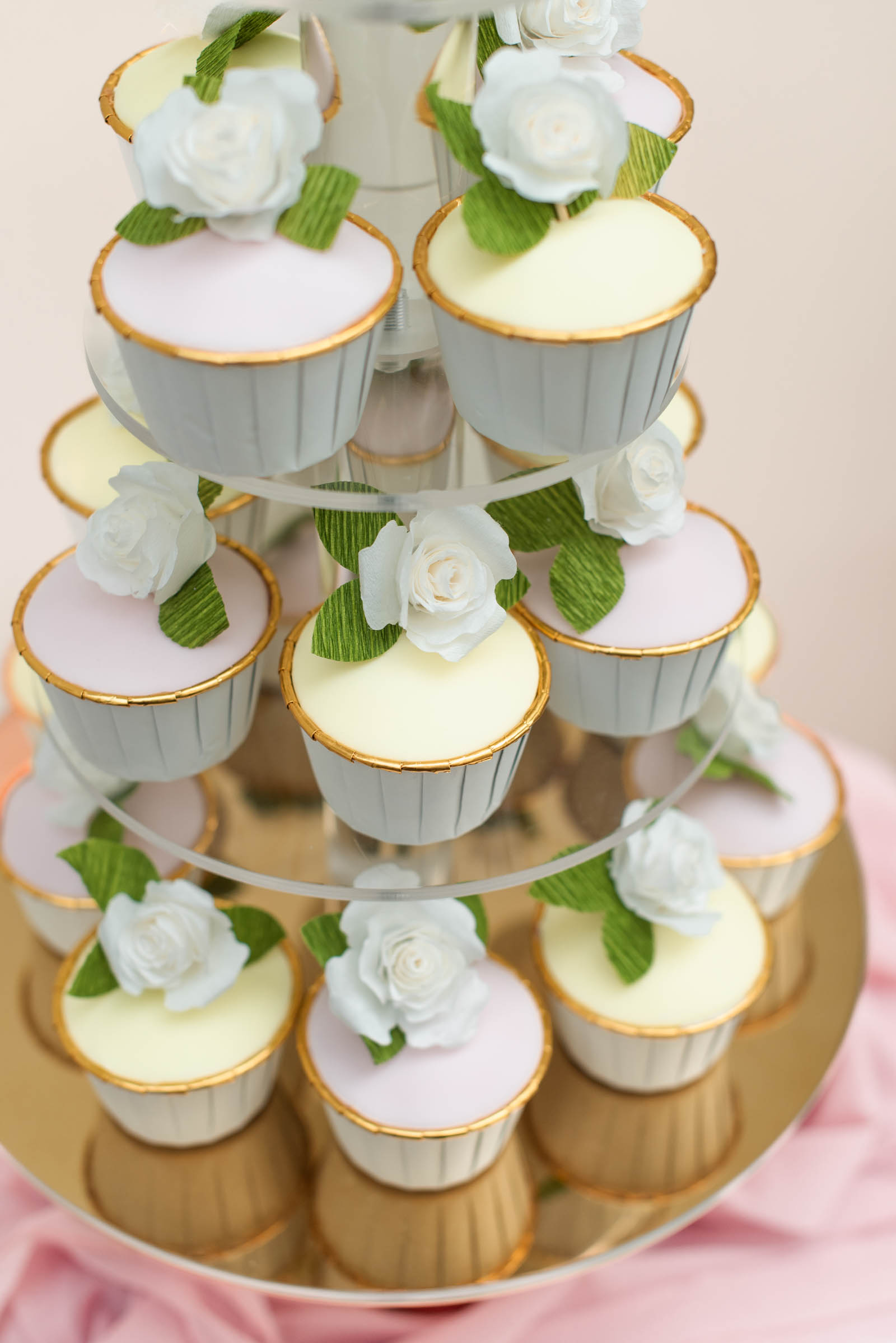 Rolled flowers made out of coffee basket filters from the Cricut Weddings book