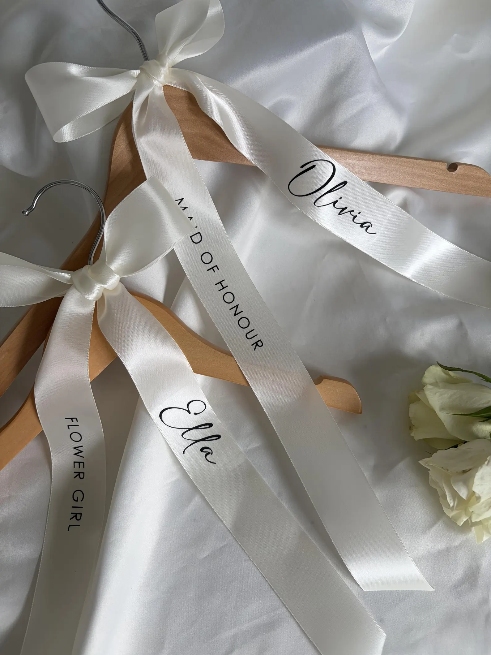 White satin ribbon with bridesmaid and maid of honor personalized that tie onto wedding hangers