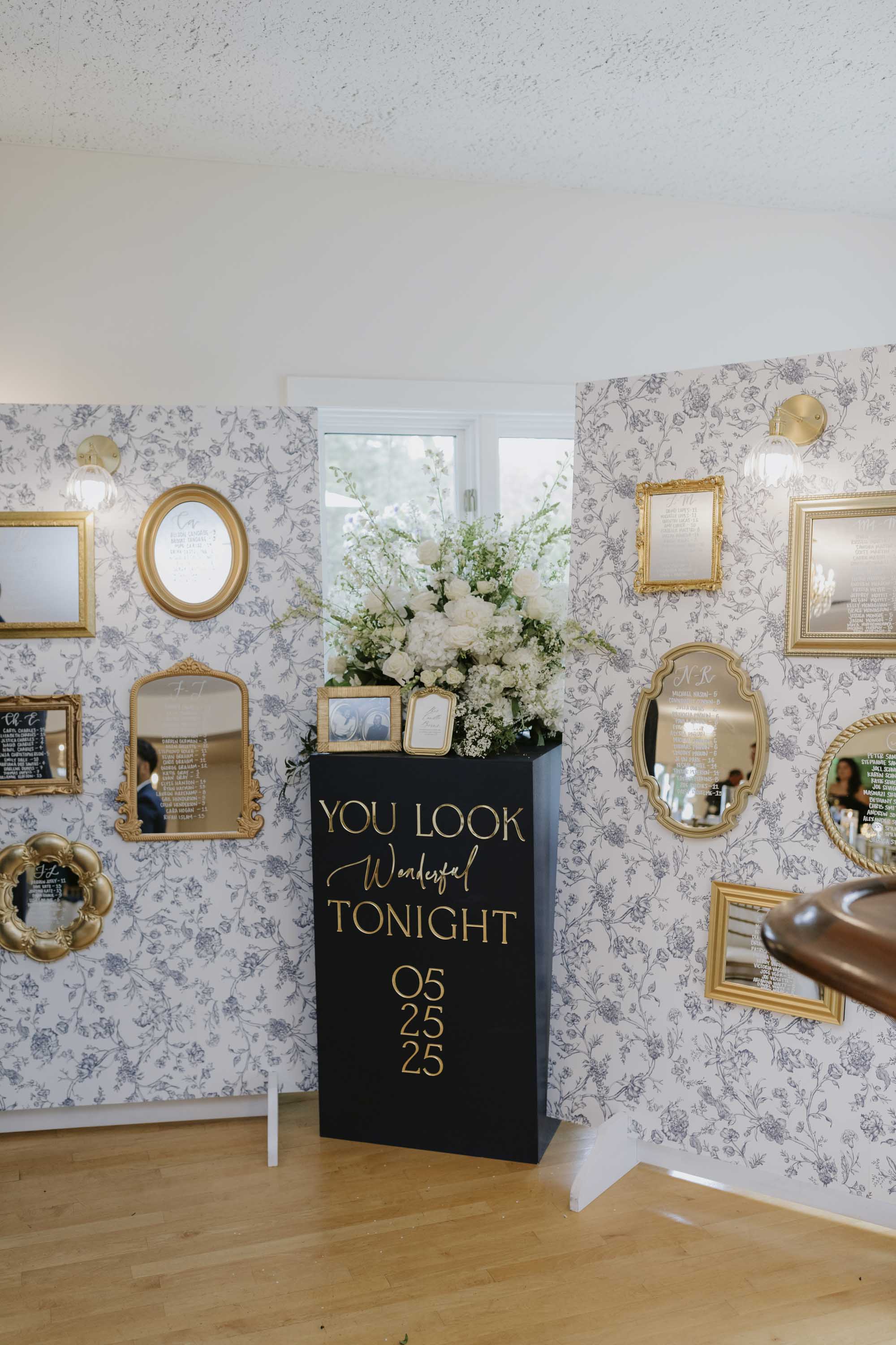 Beautiful DIY mirror gallery wall for wedding seating chart