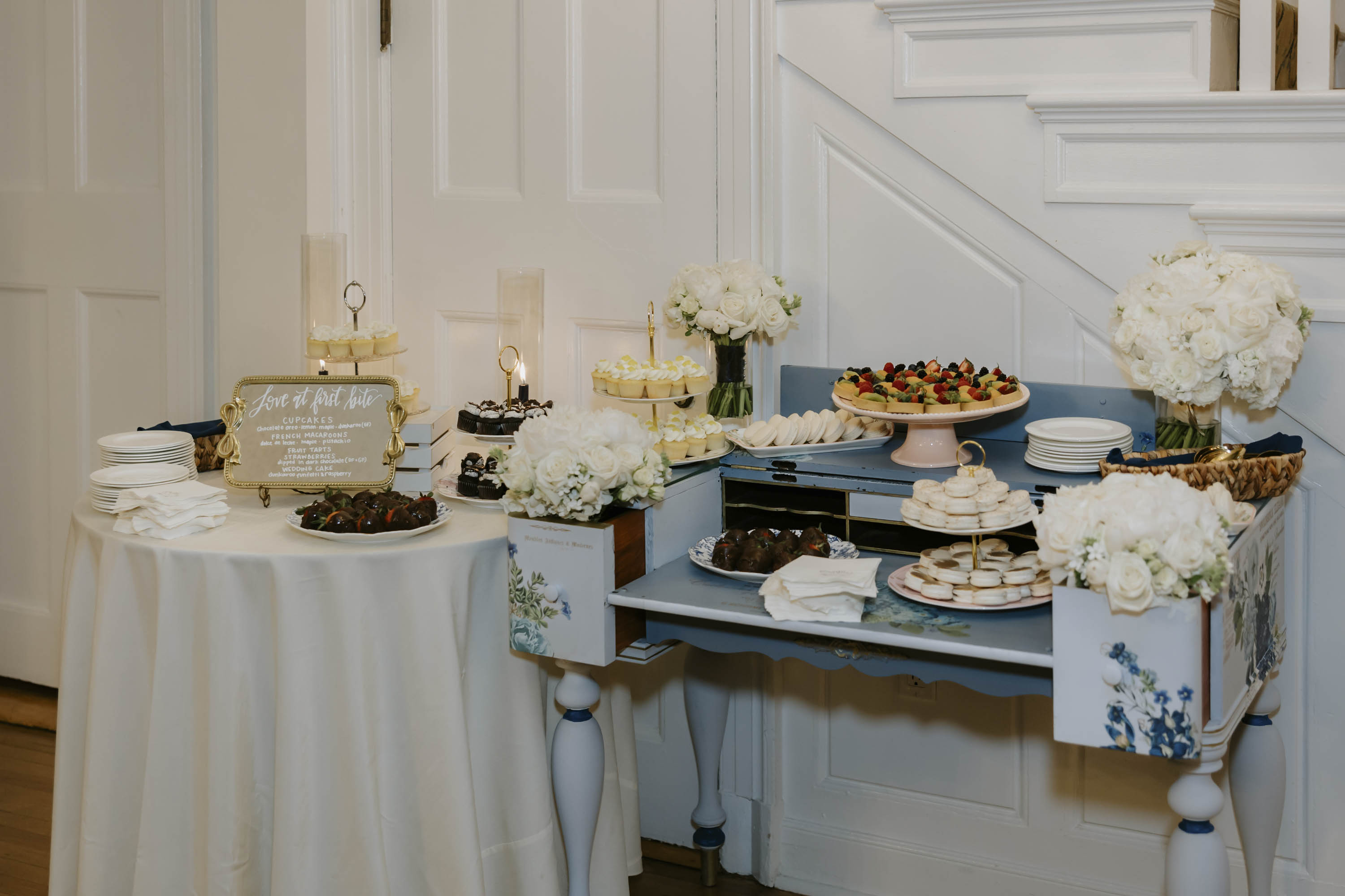 Wedding dessert bar with macarons and fruit tarts