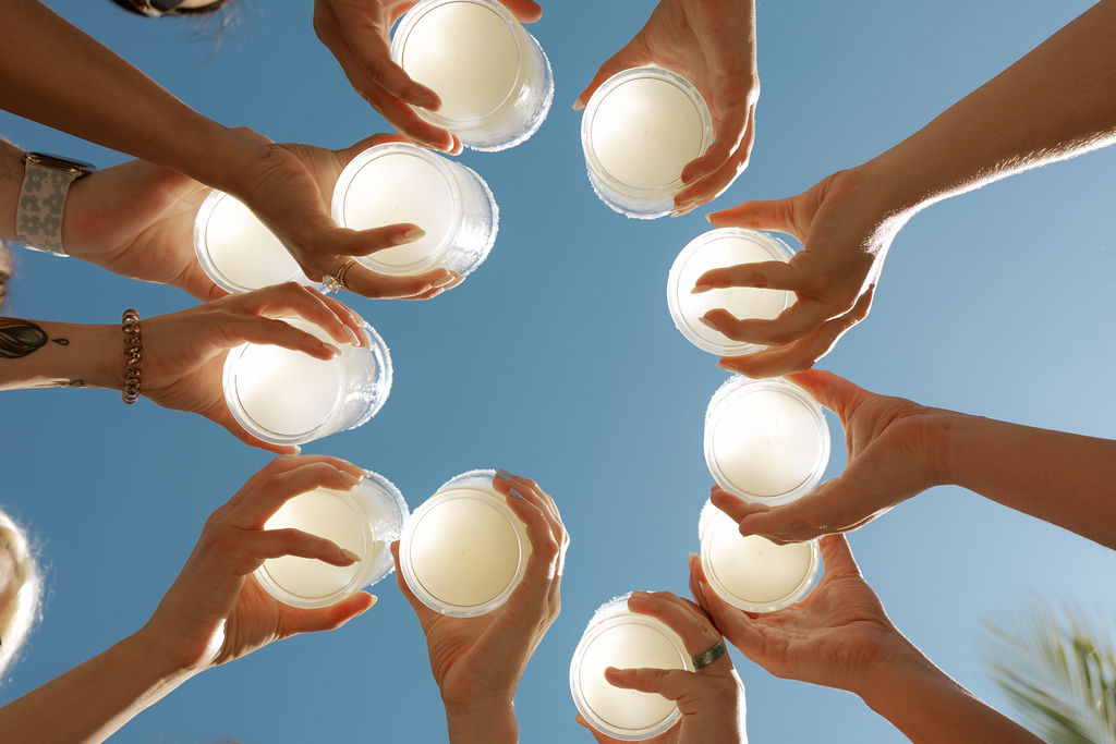 Margarita toast at Cancun destination wedding