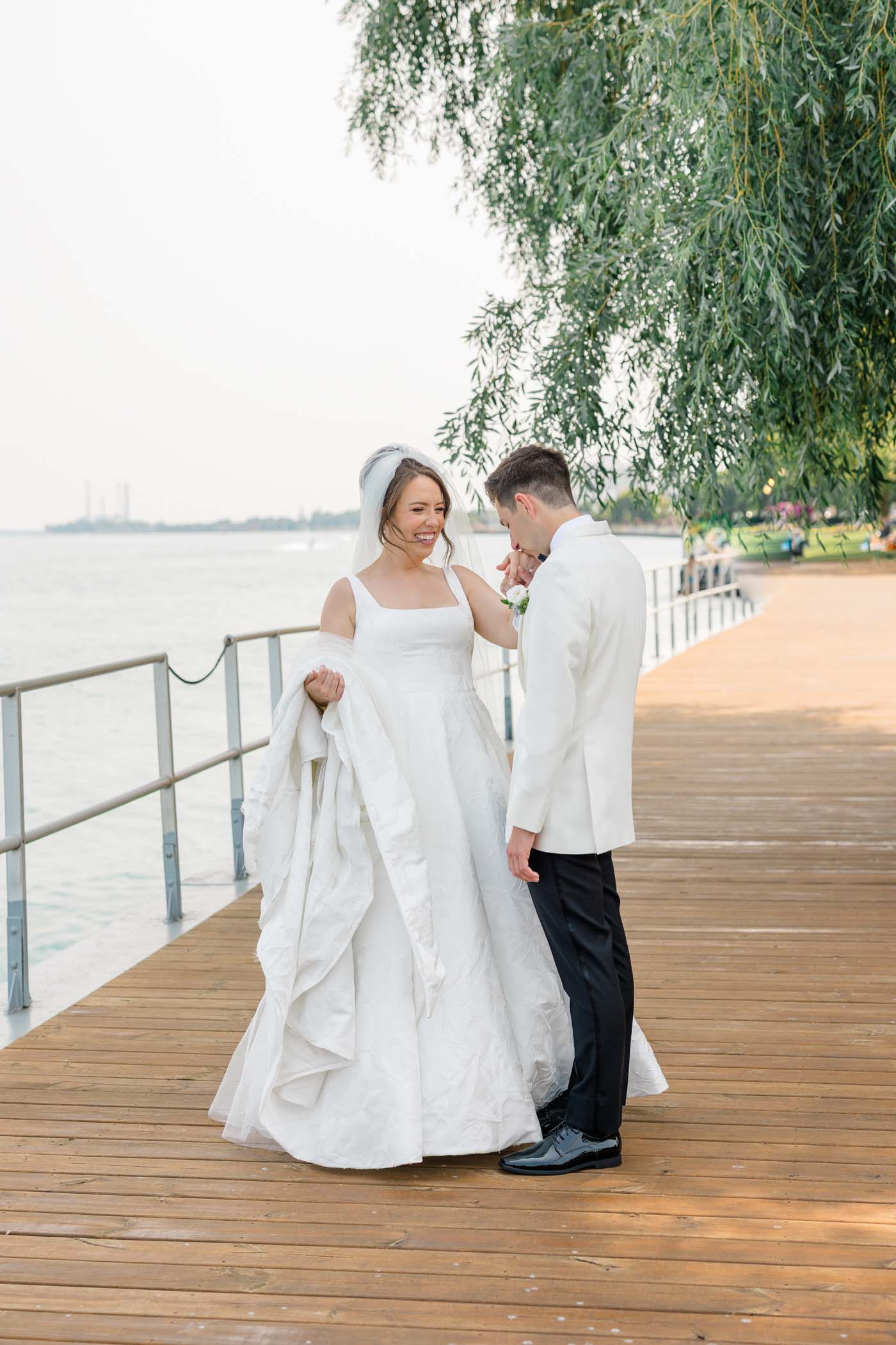 Bride wearing subtle brocade wedding dress with A line skirt