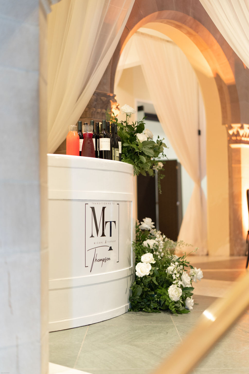 Custom wedding branded bar setup at an art museum