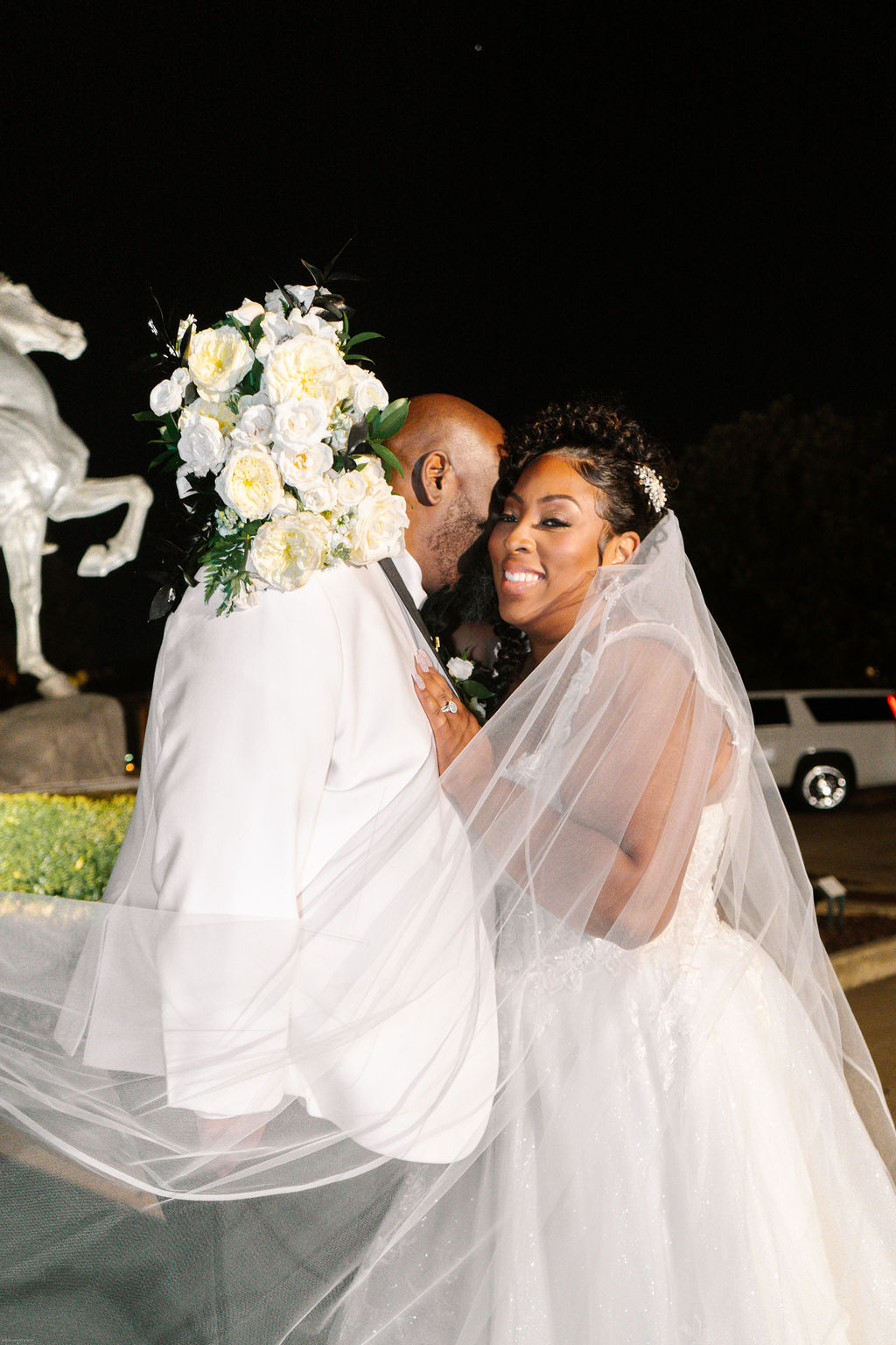 Bride and groom portrait outside at night at Chrysler Museum of Art