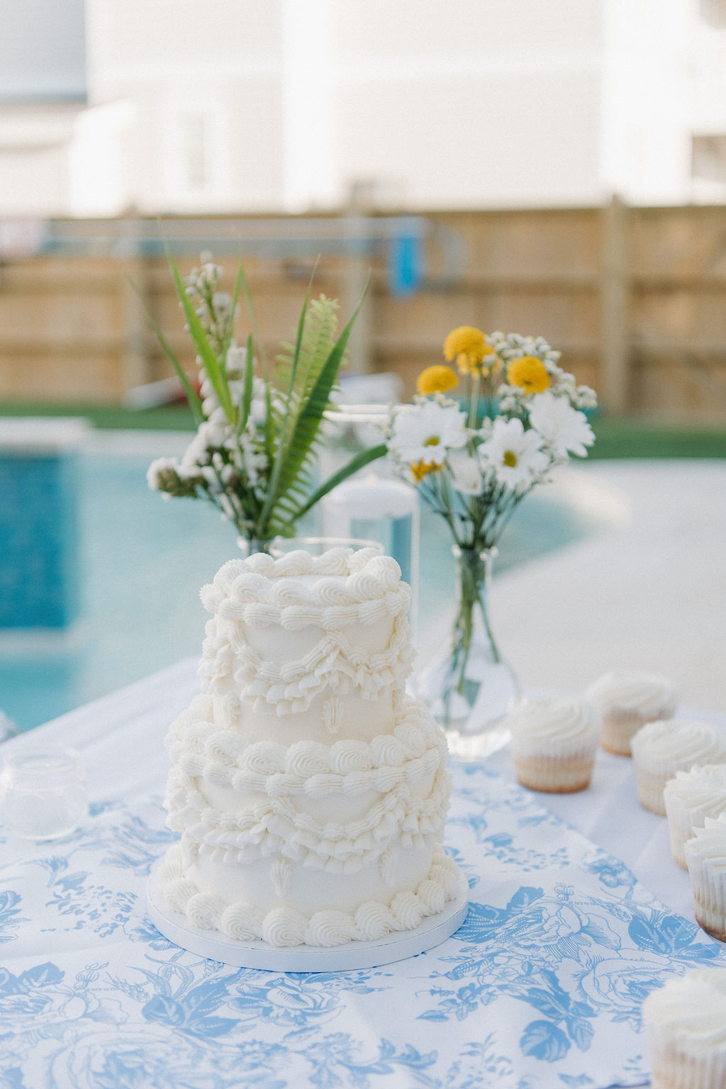Small vintage Lambeth style two tiered white wedding cake