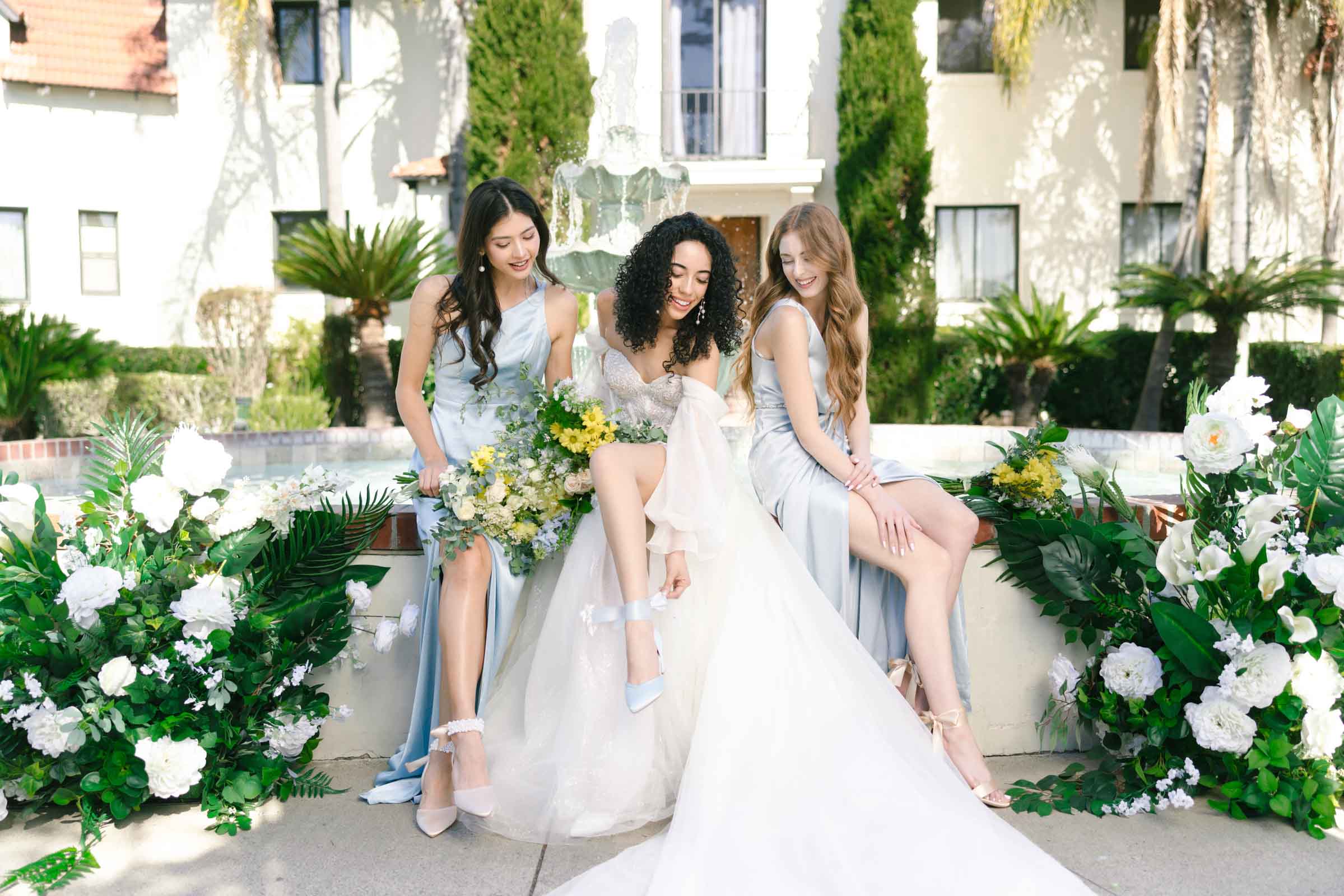 Satin pointed toe something blue bridal shoes with an ankle bow from Kailee P