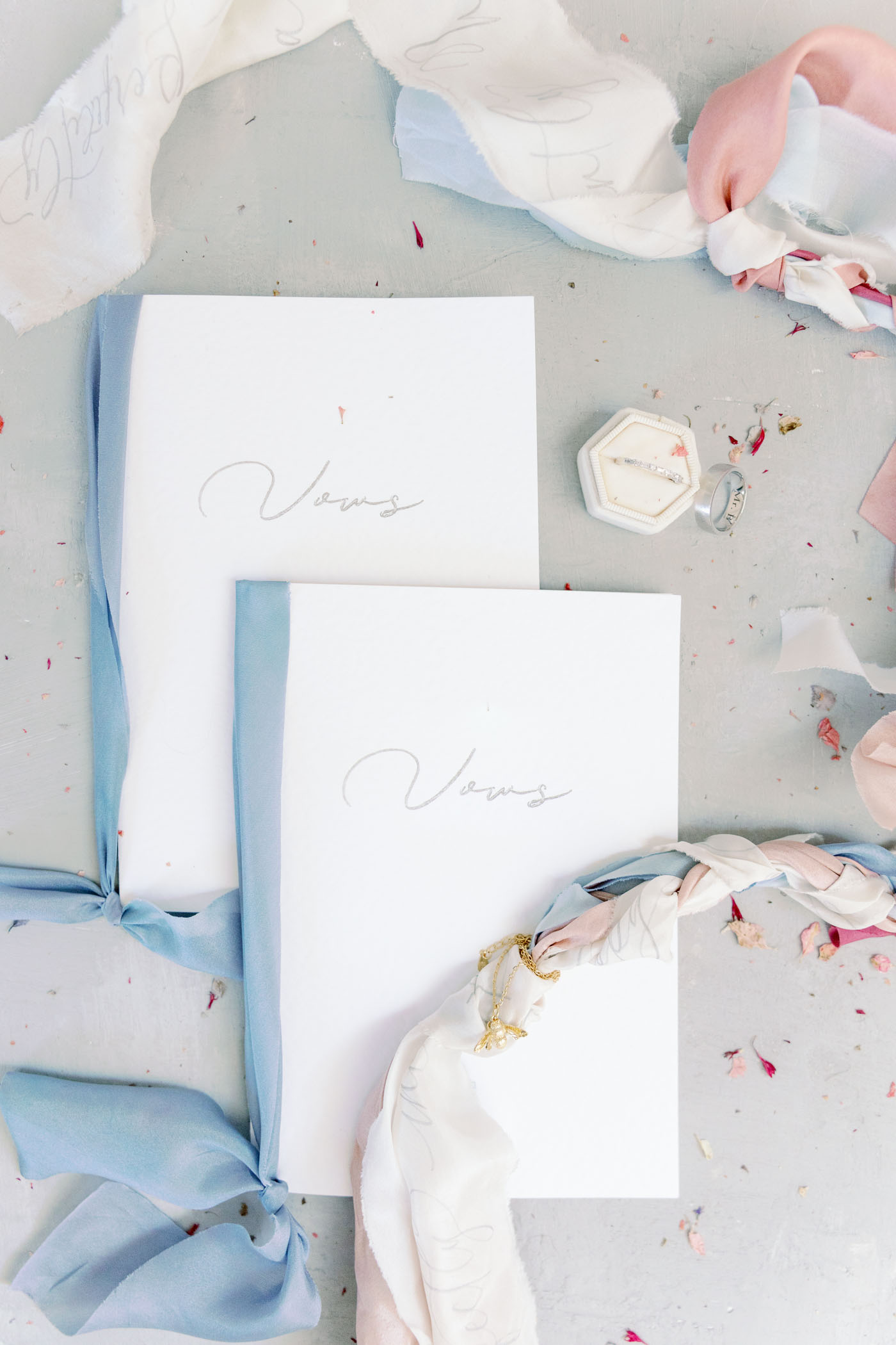 Custom foiled vow books made with a Cricut machine