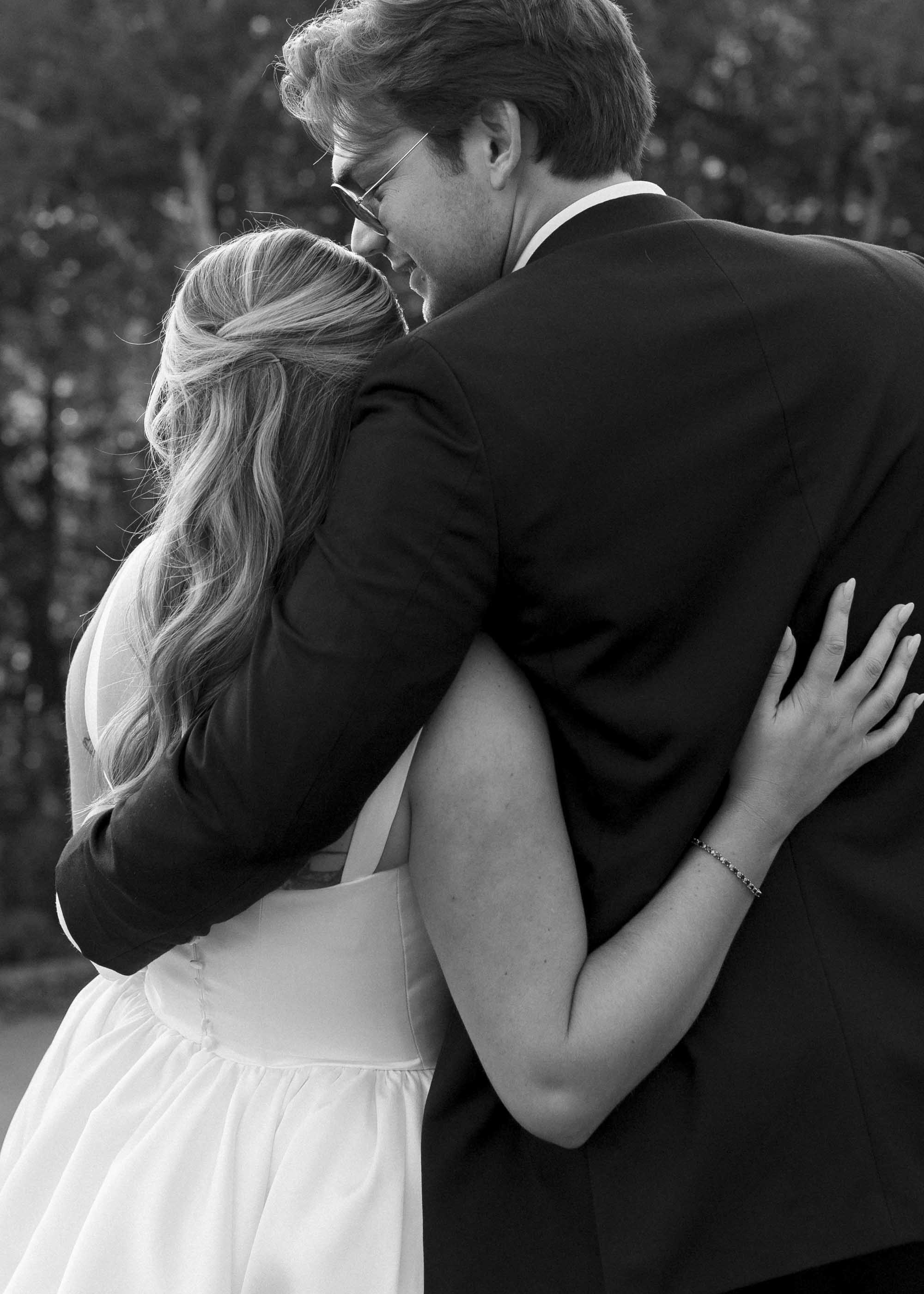 Black and white photo of bride and groom portrait moment in Vermont