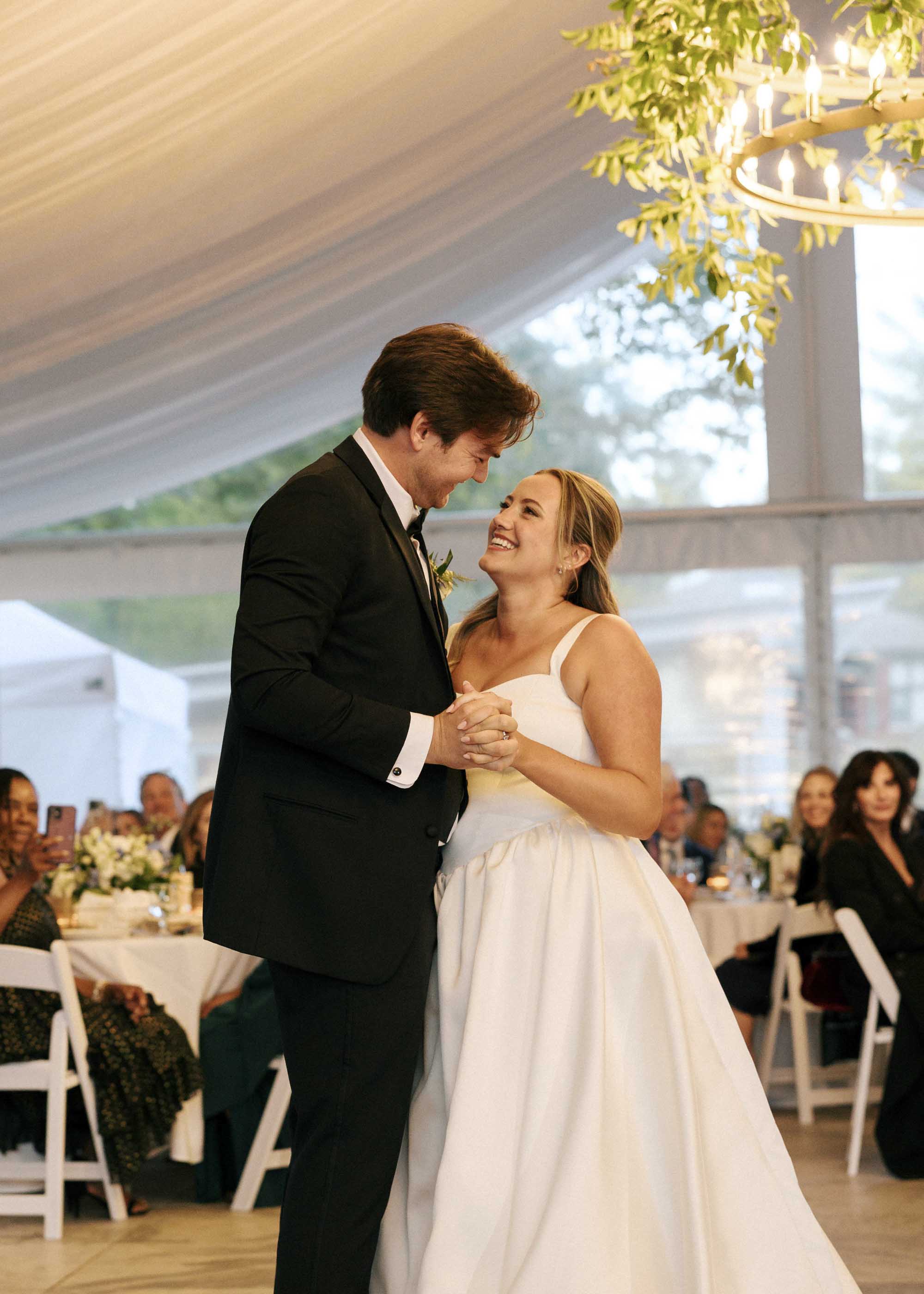 Bride and groom share their first dance at Wilburton tent wedding