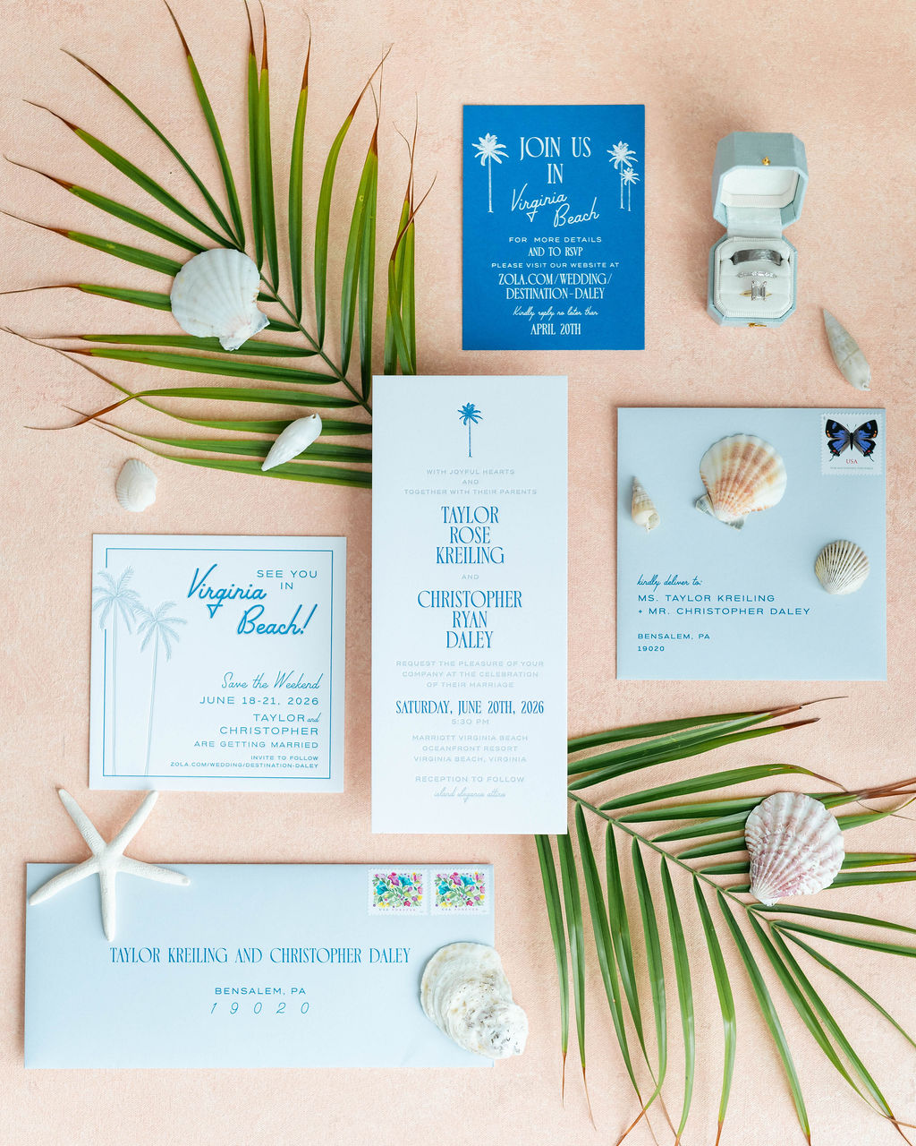 Light blue and cobalt blue letterpress wedding invitation suite featuring palm trees and retro beach font for coastal wedding