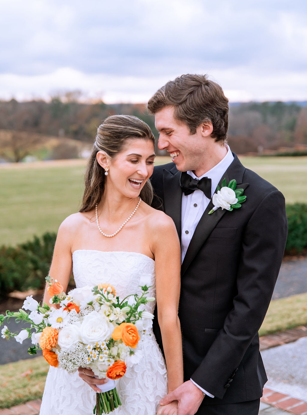 Happy bride and groom at Country Club of Virginia