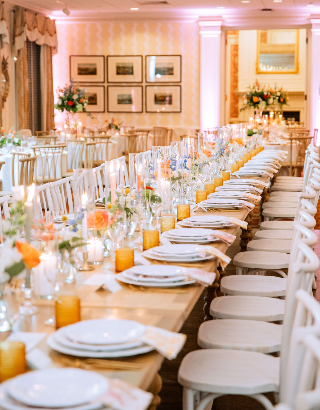 Kings table wedding reception with candlesticks and bud vases