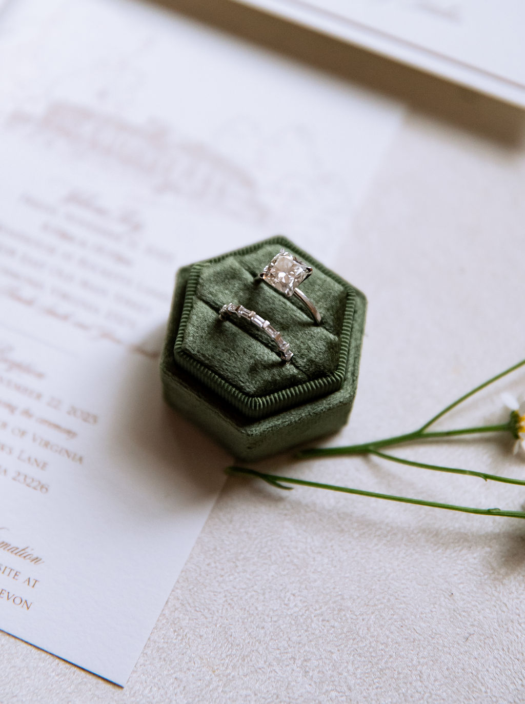 Princess cut diamond engagement ring in dark green velvet ring box