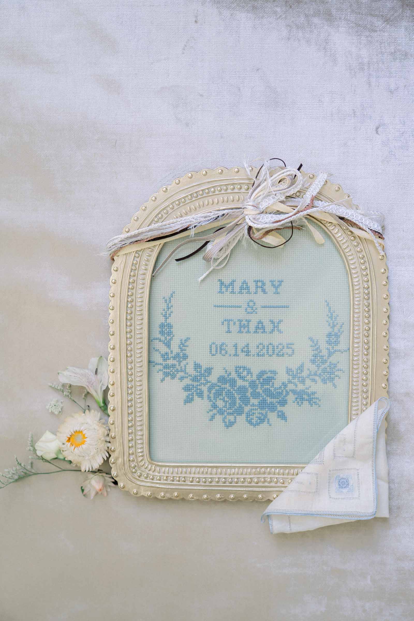 Heirloom wedding embroidery in blue thread for bride and grooms vintage wedding