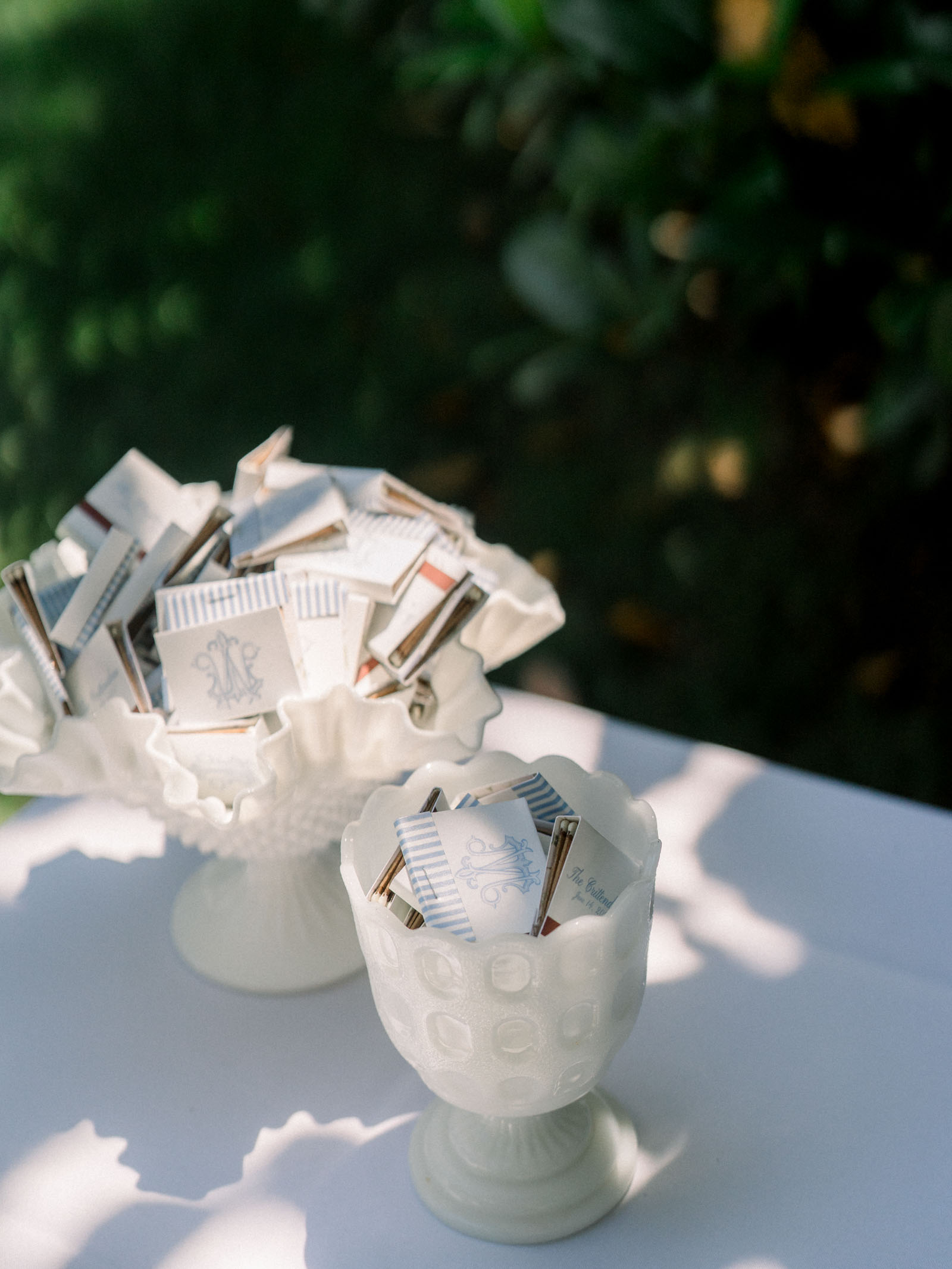 Custom matchbook favors with blue stripes and wedding monogram